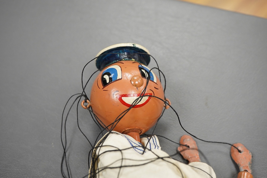A scarce boxed Pelham Puppet sailor with carved wood cap, ‘Infant Control’